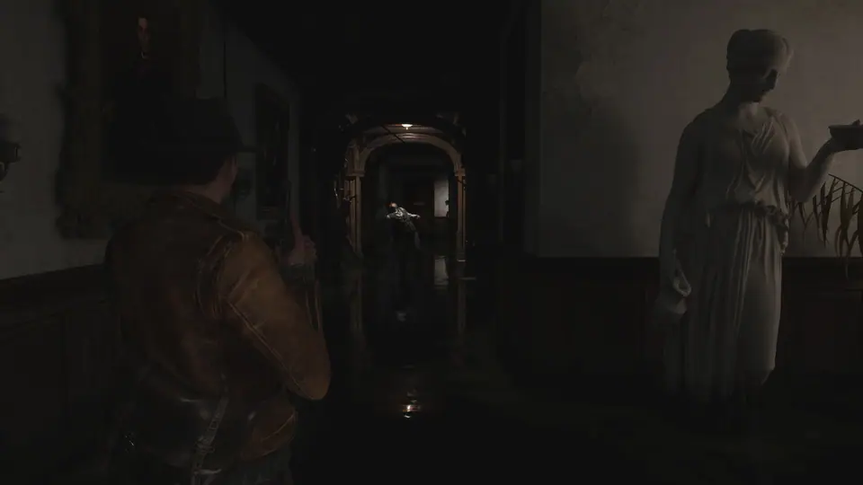 Calvin follows a ghostly figure through a dark hotel corridor